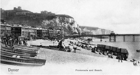 Promenade and Beach c.1900. Bathing machines on the beach in the early 20th Century.