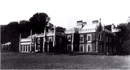Kearsney Abbey c.1900.  The billiards room, which still stands, is the white section of the house with the four ground floor windows at the left hand end of the building.
