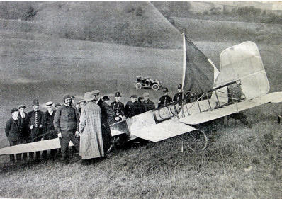 Bl�riot at Dover, 1909. He is standing next to his plane after after the crash landing. 